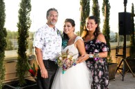 The bridal bouquet with the bride with mom and dad
